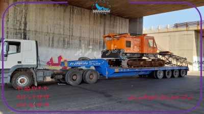 حمل محمولات سنگین جرثقیل بوم خشک Dry boom crane از مبدا تهران به مقصد گل گهر توسط کمرشکن 7محور شرکت حمل ونقل خلیج فارس ترابر